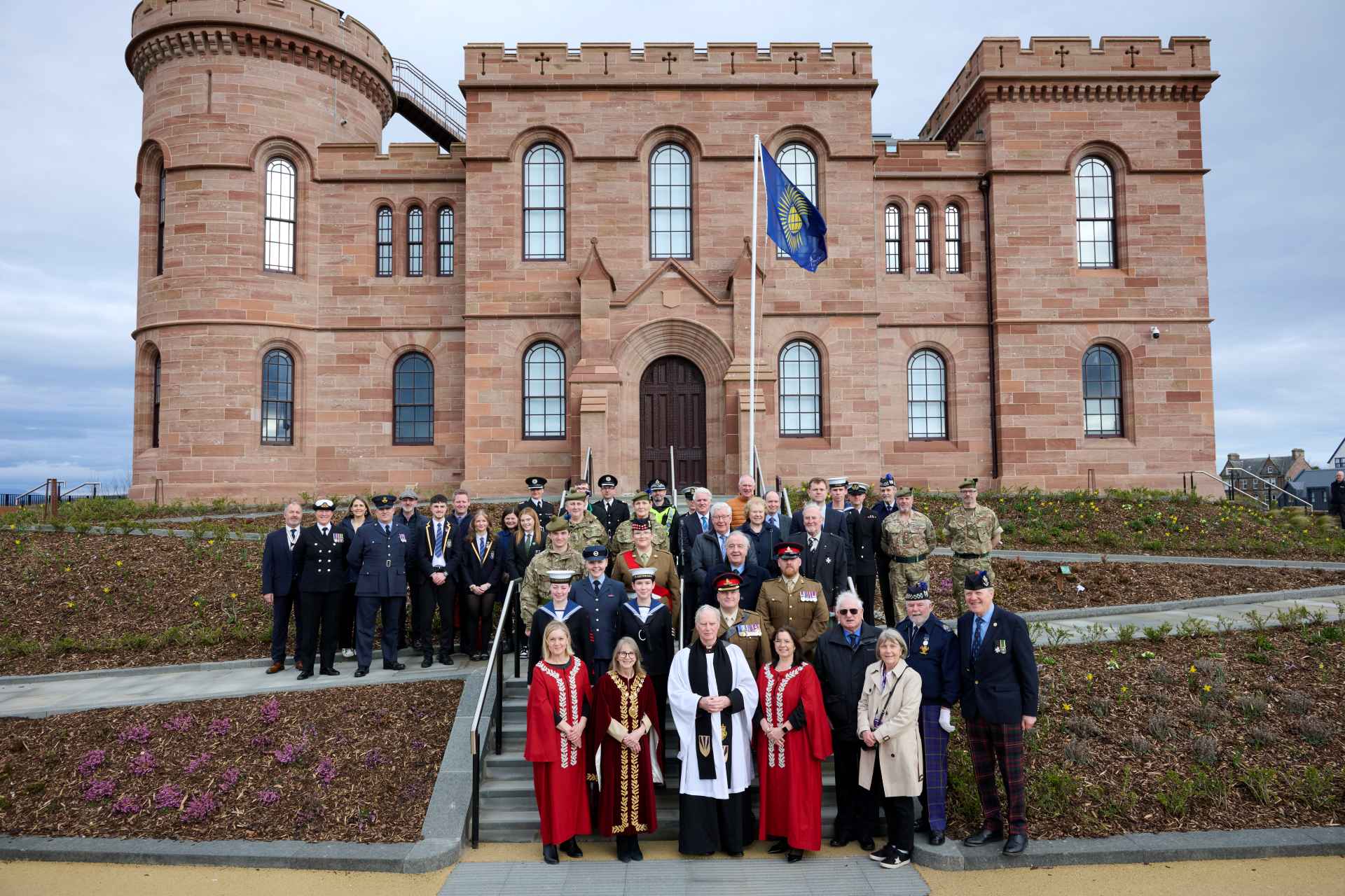 Photo of Provost and guests outside Inverness Castle Experience to mark Commonwealth Day.