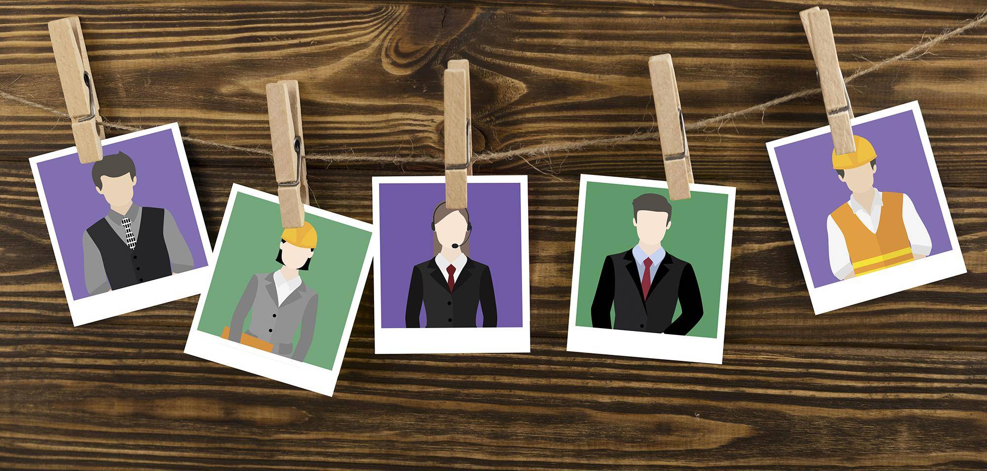 Photographs hanging from a wire by pegs