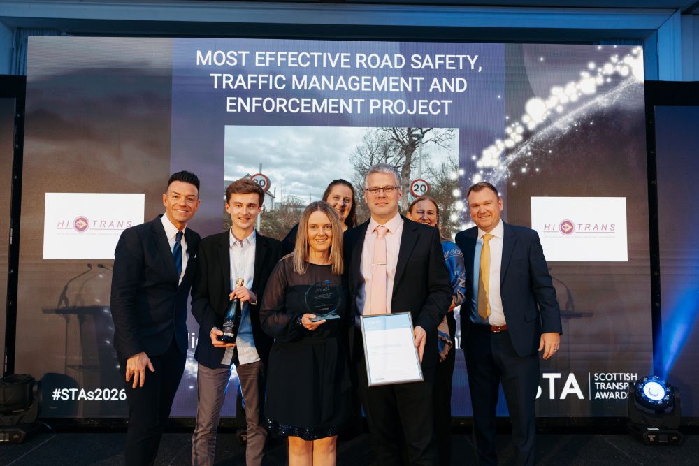 The team getting presented with their prize at the award ceremony